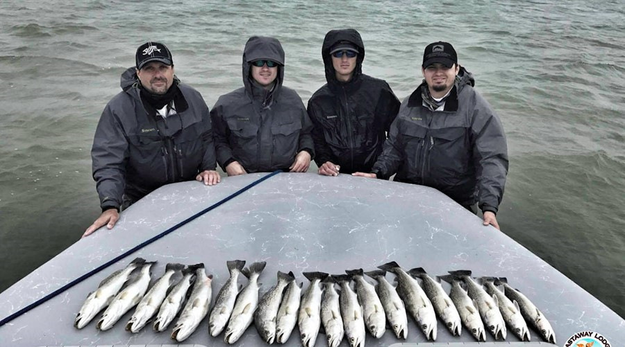 Brian S. and guests working the Trout over on topwater.